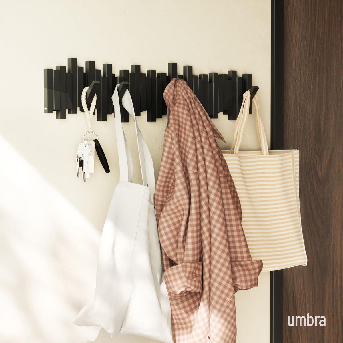Umbra Sticks Wall-Mounted Coat Rack with 8 Retractable Pegs, Black