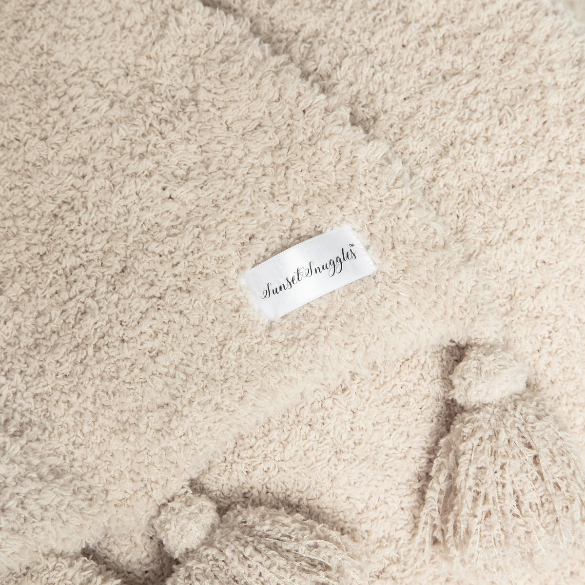 Sunset Snuggles Blushing Beige Solid Tassel Throw, 54 x 76 in